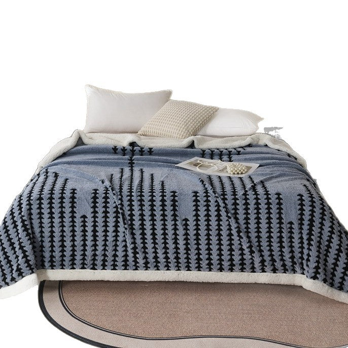 Double-layered throw blanket with lamb fleece look