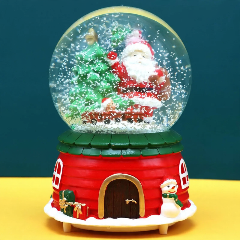 Christmas music box with glass sphere and snow effect