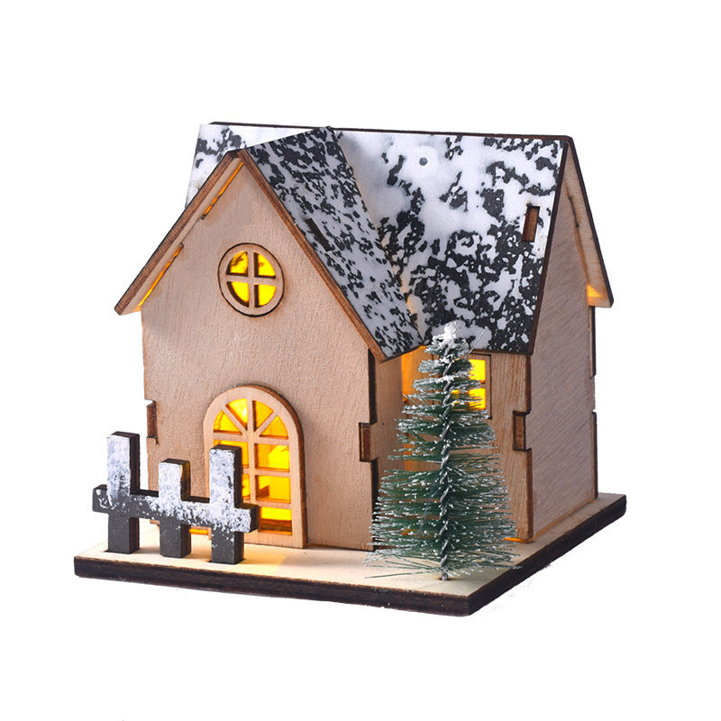 Illuminated Christmas wooden house in Scandinavian style