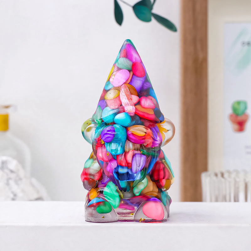 Dwarf figure made of resin with gemstones