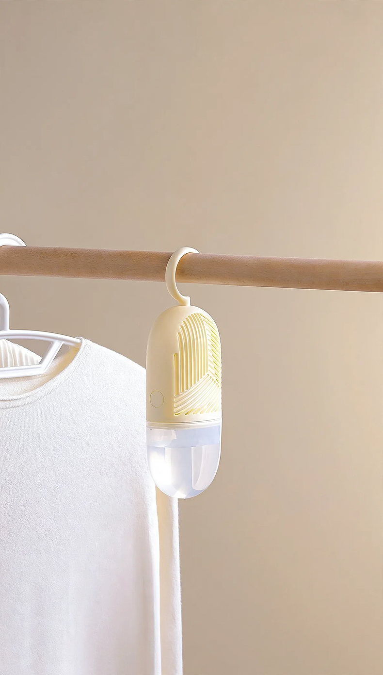 Hanging moisture absorber bag