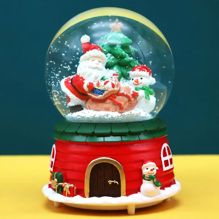 Christmas music box with glass sphere and snow effect