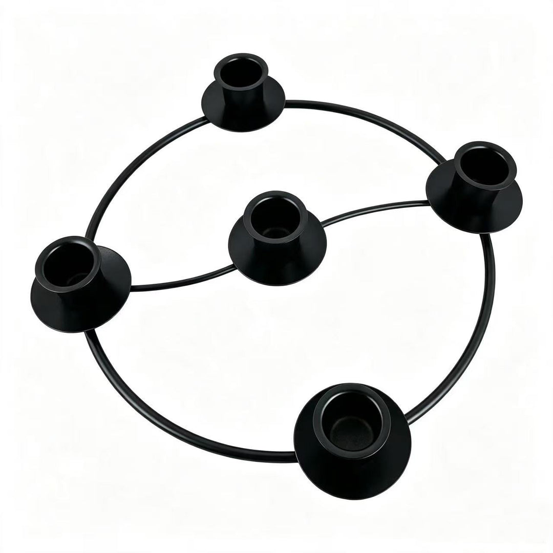 Metal candle holder in wreath design