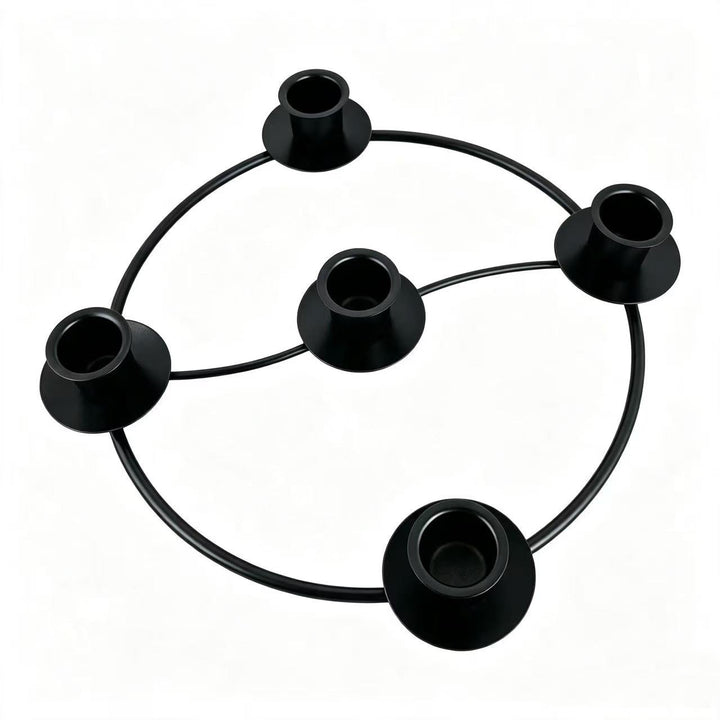 Metal candle holder in wreath design