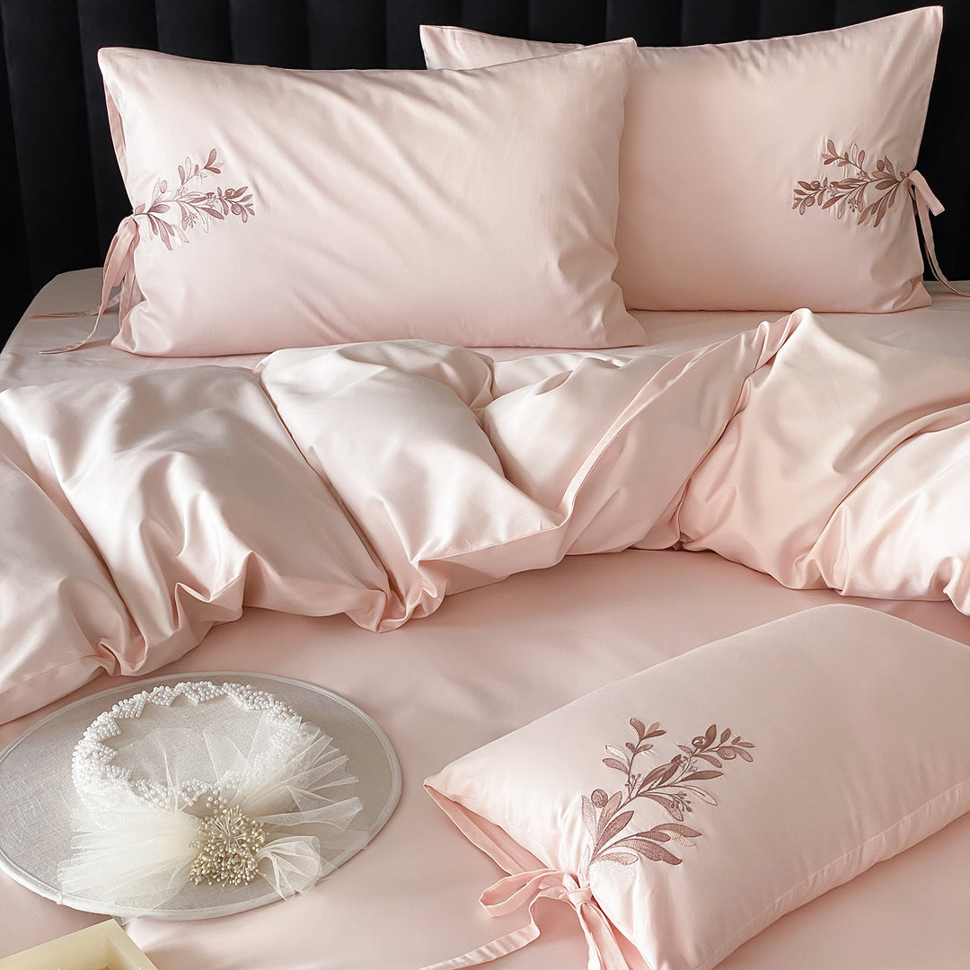 Embroidered cotton bedding with floral design