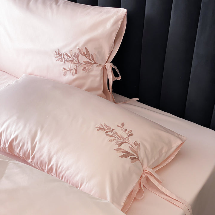 Embroidered cotton bedding with floral design