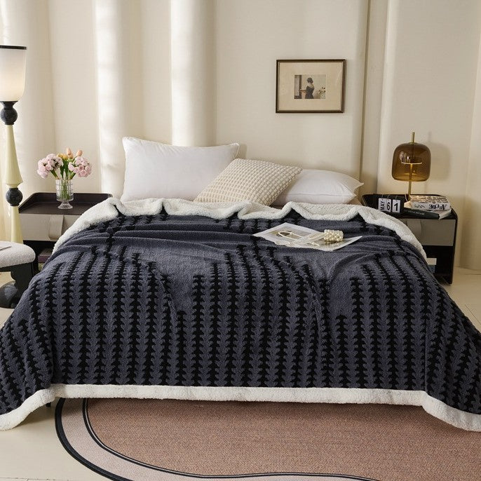 Double-layered throw blanket with lamb fleece look
