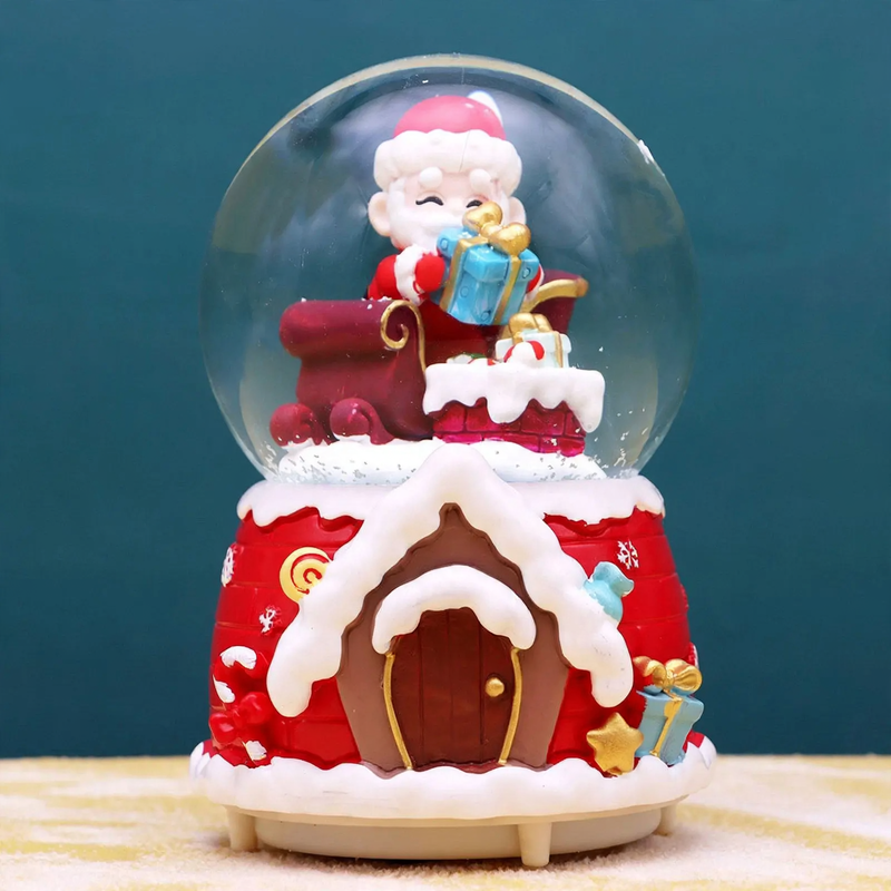 Christmas music box with glass sphere and snow effect