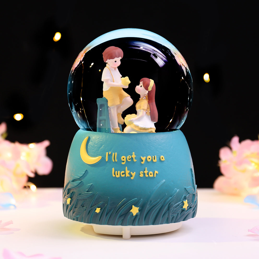 Fairy-tale snow globe with music and light