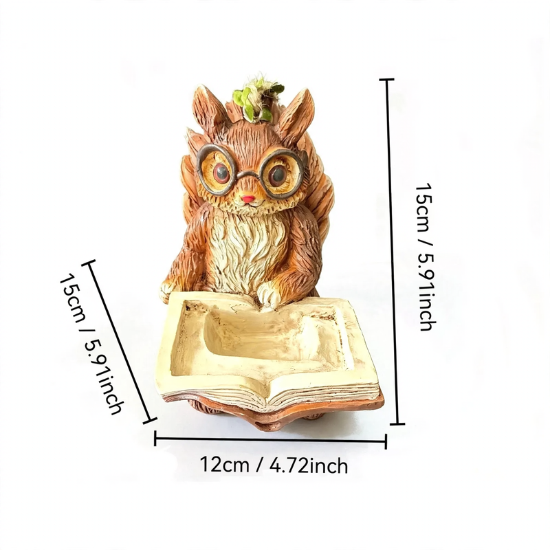 Decorative birdhouse in stump tree look made of resin