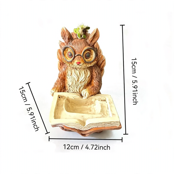 Decorative birdhouse in stump tree look made of resin