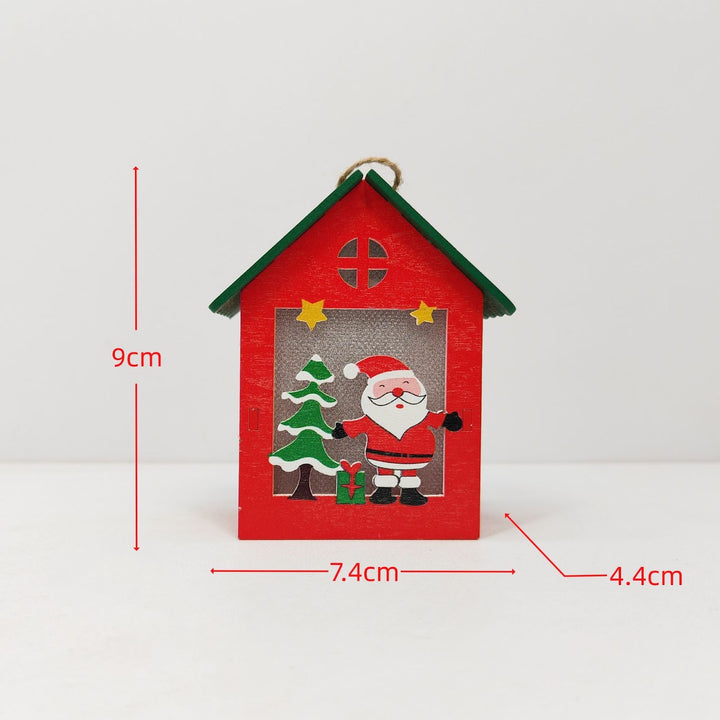 Illuminated wooden house for Christmas decoration