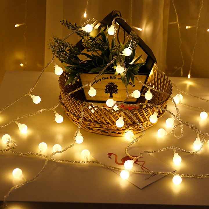 LED string lights with stars and balls for festive decoration