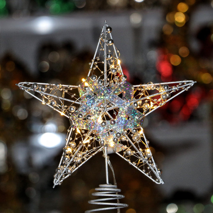Christmas tree star top made of iron, illuminated