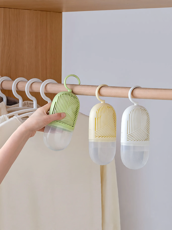 Hanging dehumidifier bag for wardrobes