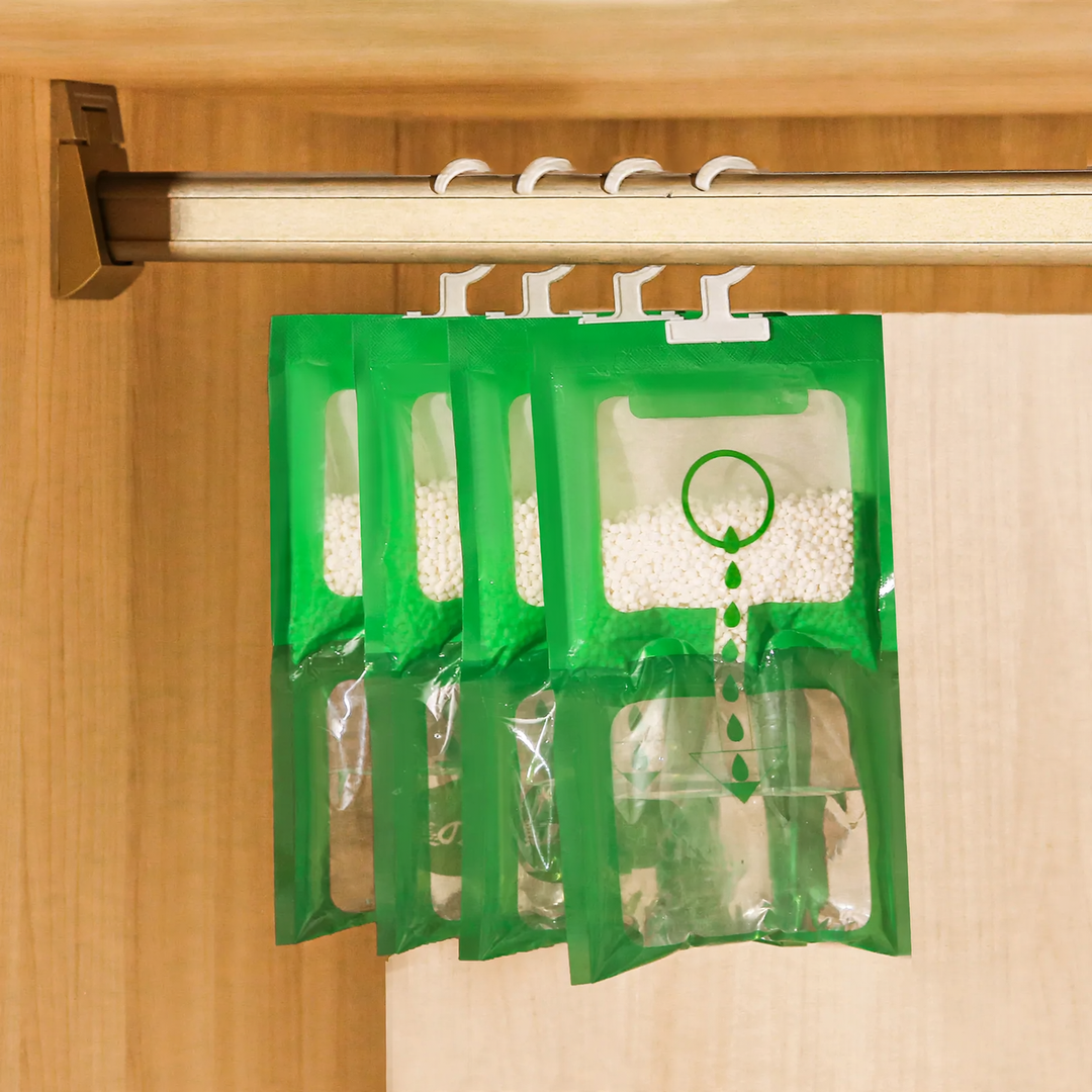 Hanging dehumidifier bag for closets and living spaces