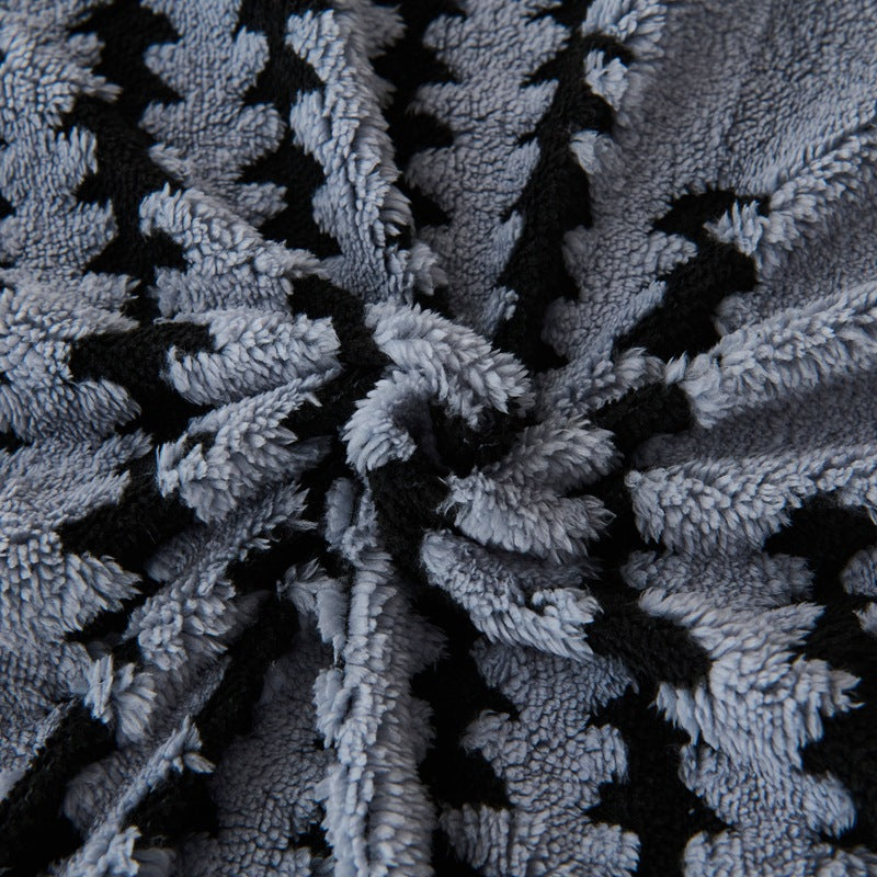 Double-layered throw blanket with lamb fleece look