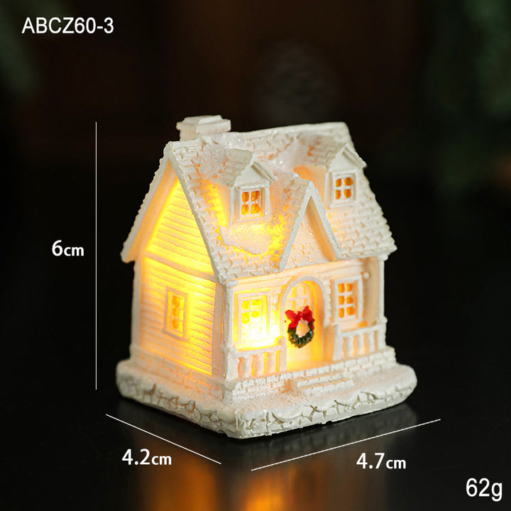 Illuminated miniature snow house made of resin