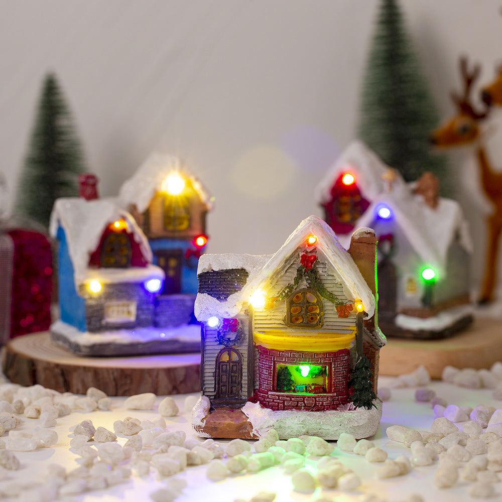 Illuminated Christmas cottage with LED light