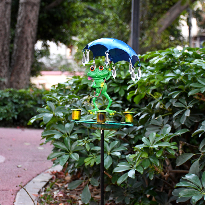 Birdbath made of stainless steel with frog motif