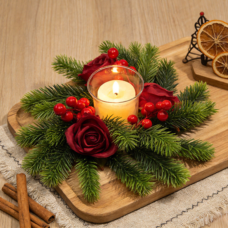 Christmas candle wreath with pine needles and berries
