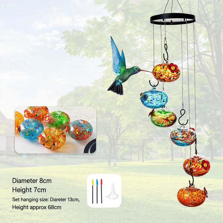 Hanging bird feeder and water station made of glass