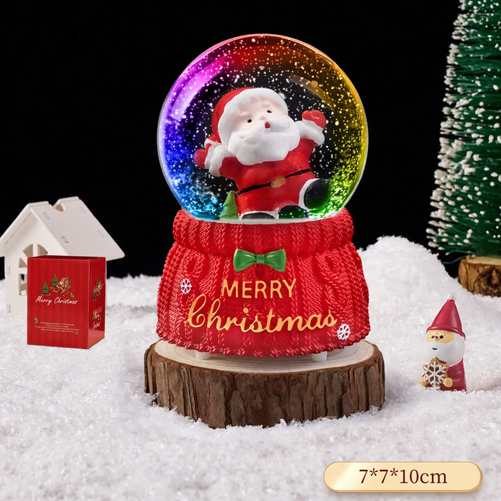 Christmas snow globe with music box and carriage design