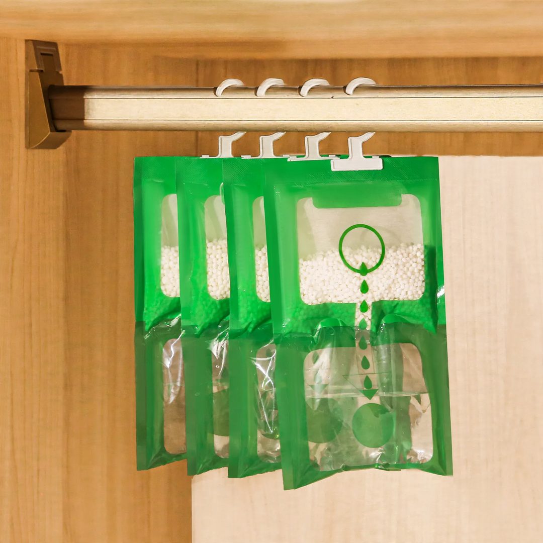 Hanging dehumidifier bag for closets and living spaces