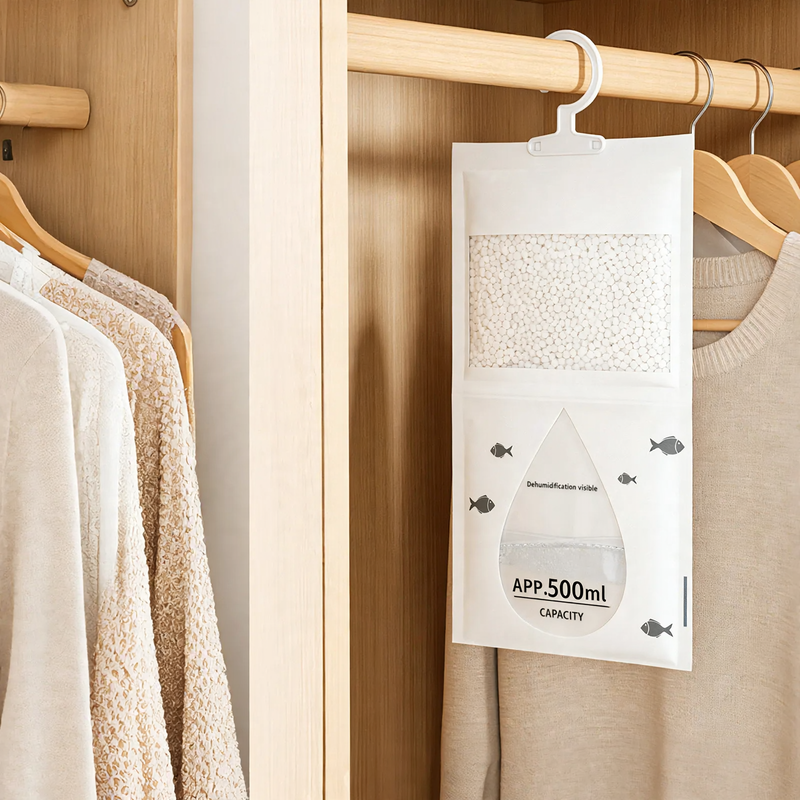 Hanging dehumidifying bag for clothing