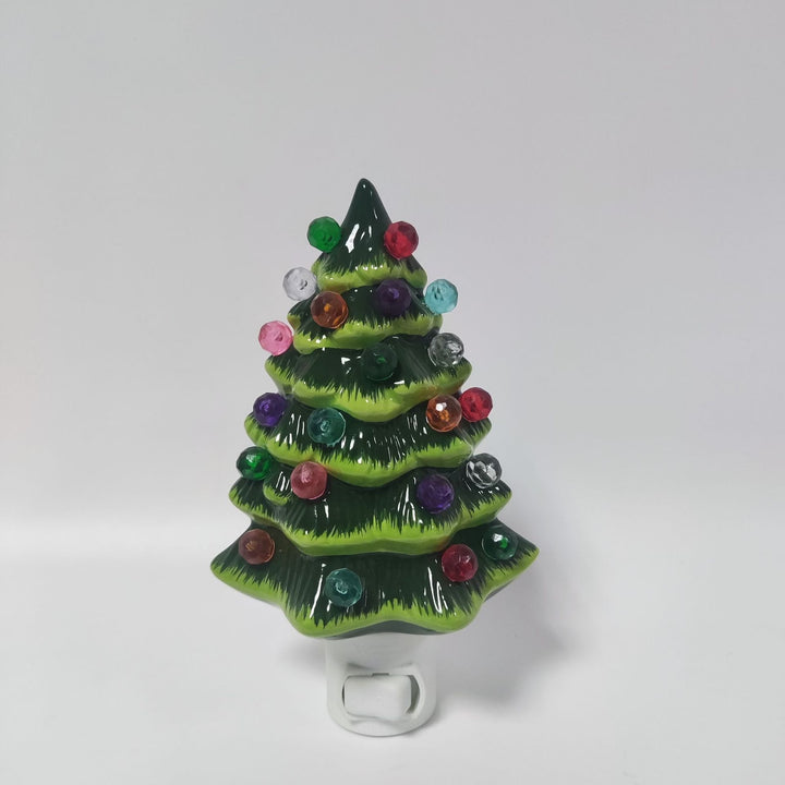 Illuminated Christmas tree figure made of resin