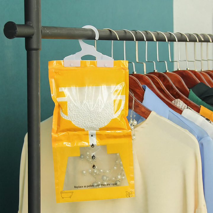 Hanging dehumidifier bag for wardrobes