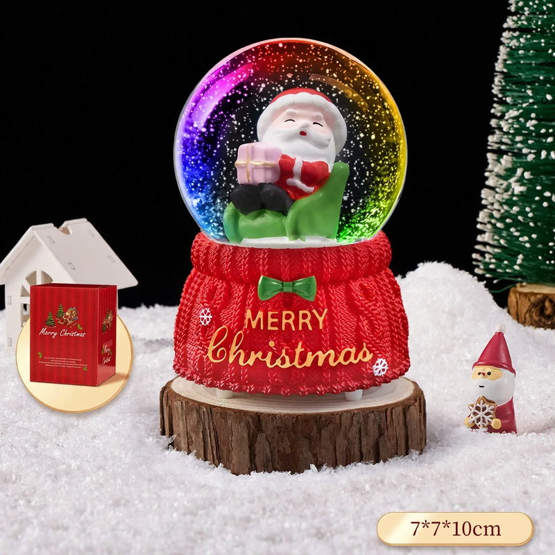 Christmas snow globe with music box and carriage design