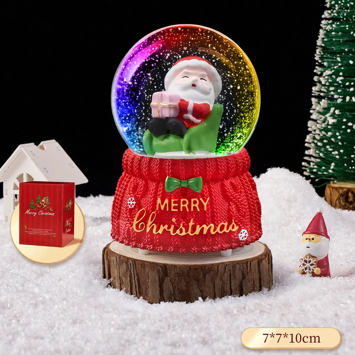 Christmas snow globe with music box and carriage design
