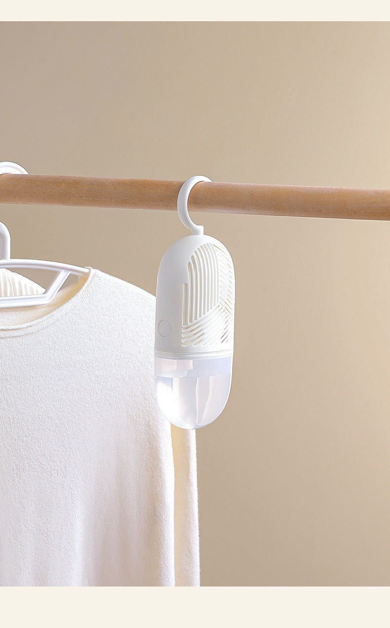 Hanging moisture absorber bag