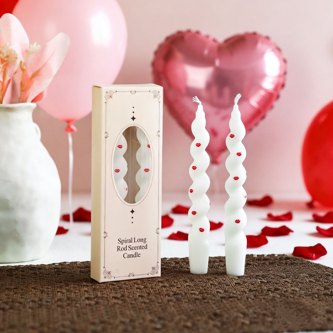 Spiral-shaped scented candle with decorative stickers