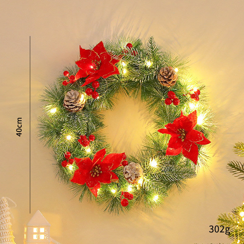 Decorative Christmas wreath with cones and LED