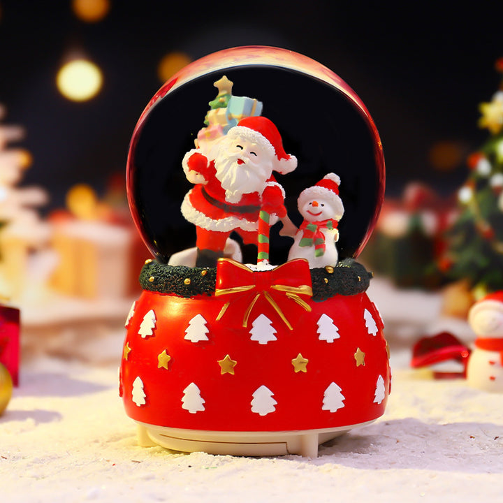 Christmas music box with glass sphere and snow effect