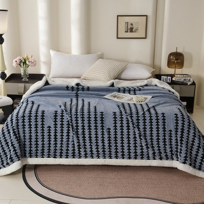 Double-layered throw blanket with lamb fleece look
