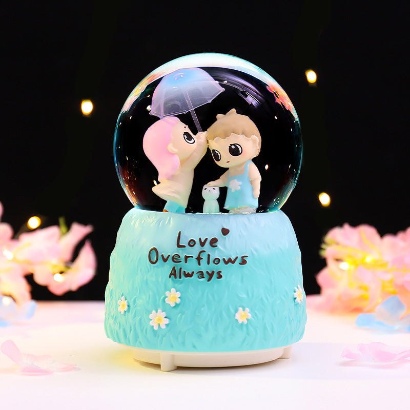 Fairy-tale snow globe with music and light