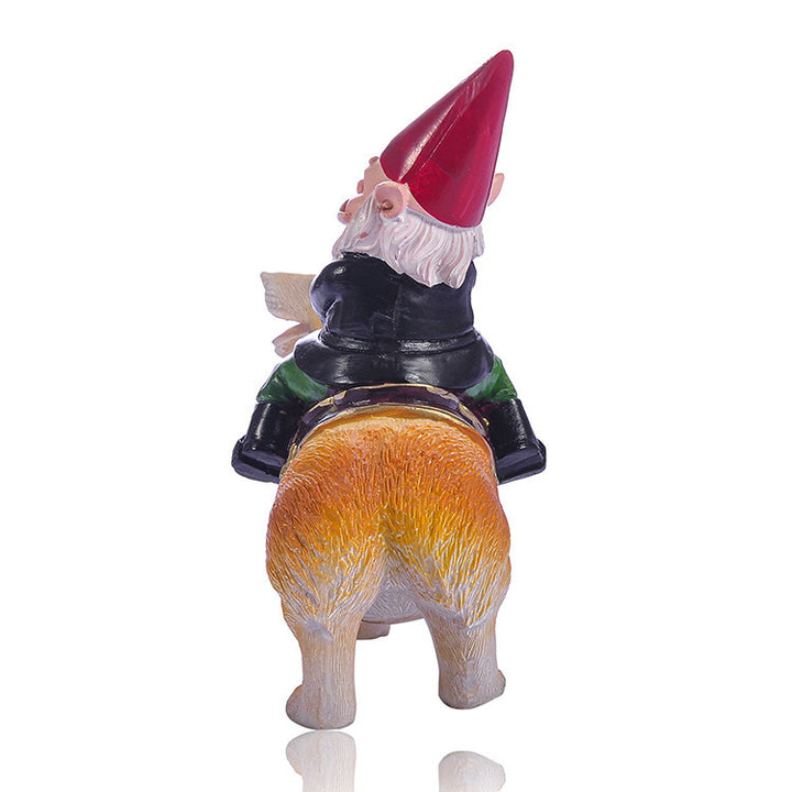 Christmas dwarf on dog, resin figure, 12x7x15 cm