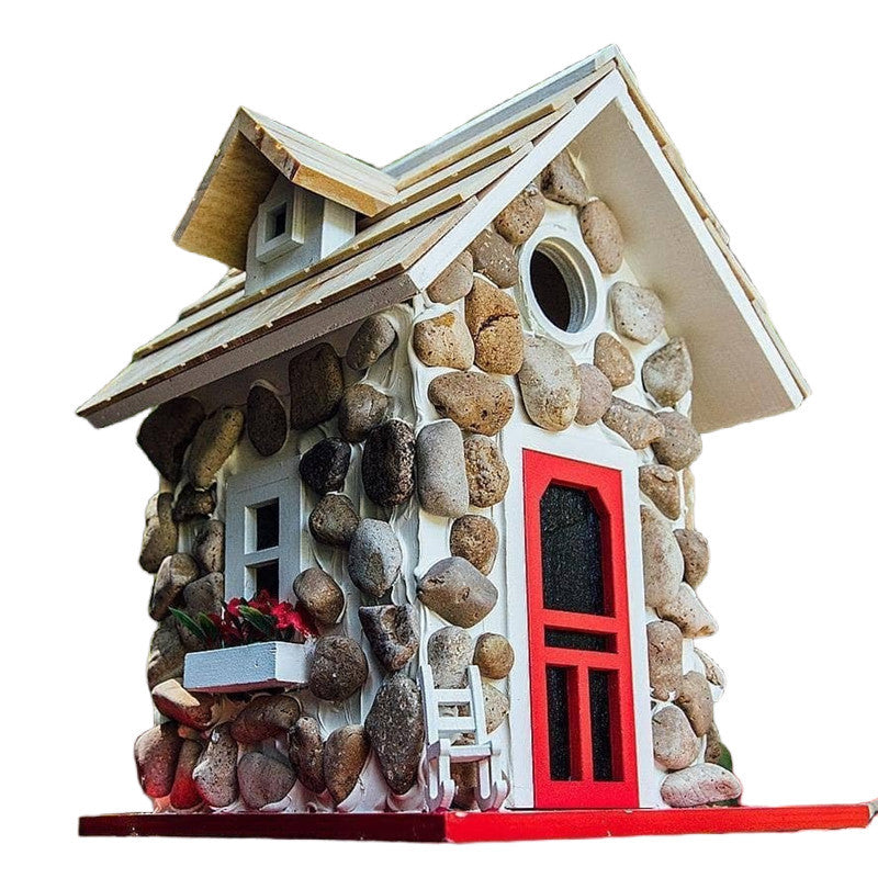 Decorative birdhouse in stone look made of resin