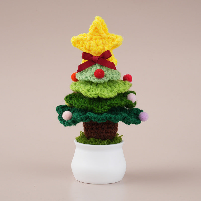 Handcrafted crocheted Christmas tree potted plant