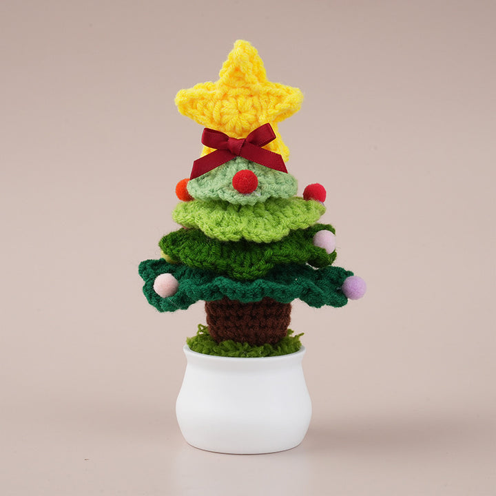 Handcrafted crocheted Christmas tree potted plant