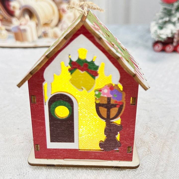 Illuminated Christmas wooden house in Scandinavian style