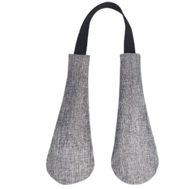 Activated carbon moisture absorber for shoes and sports equipment