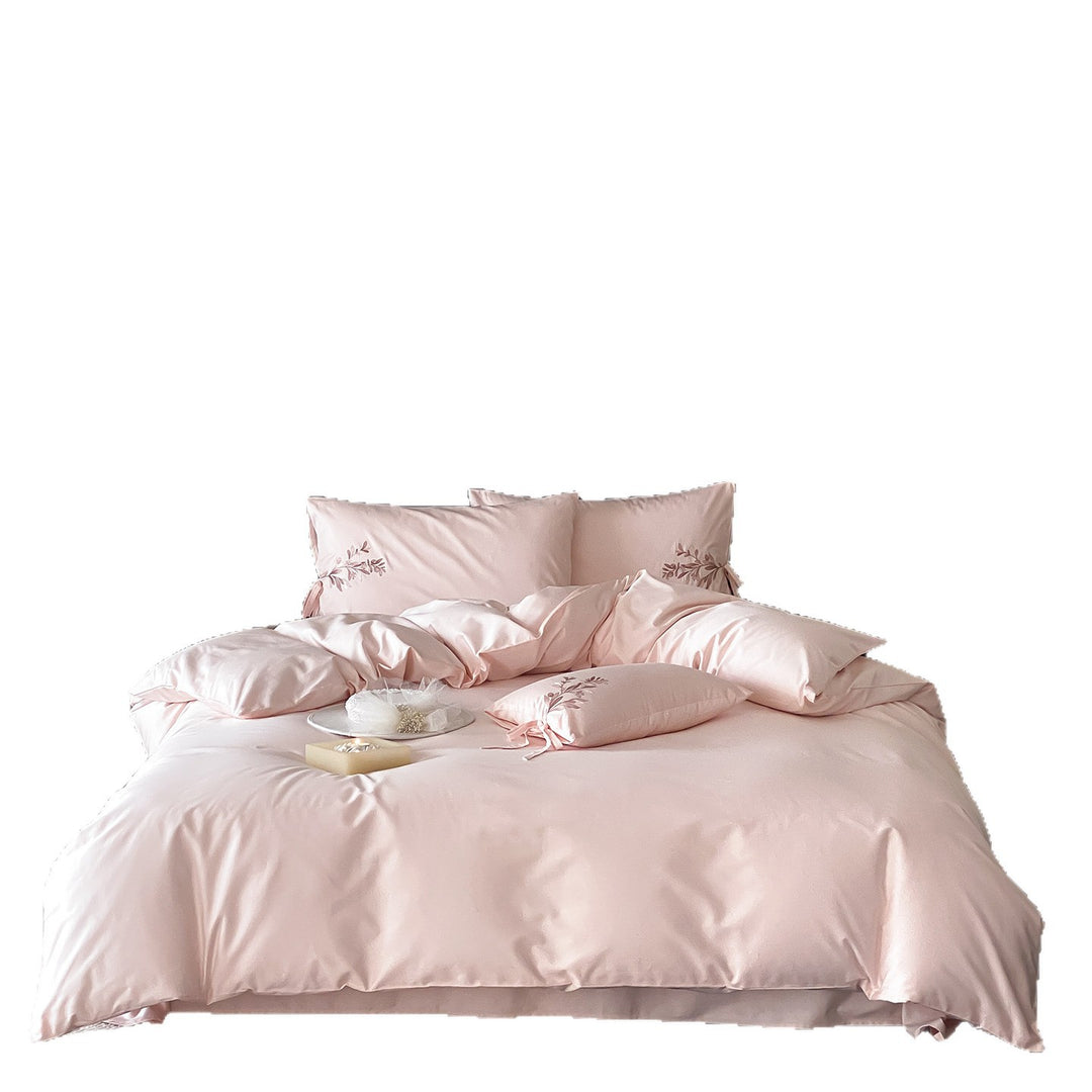 Embroidered cotton bedding with floral design