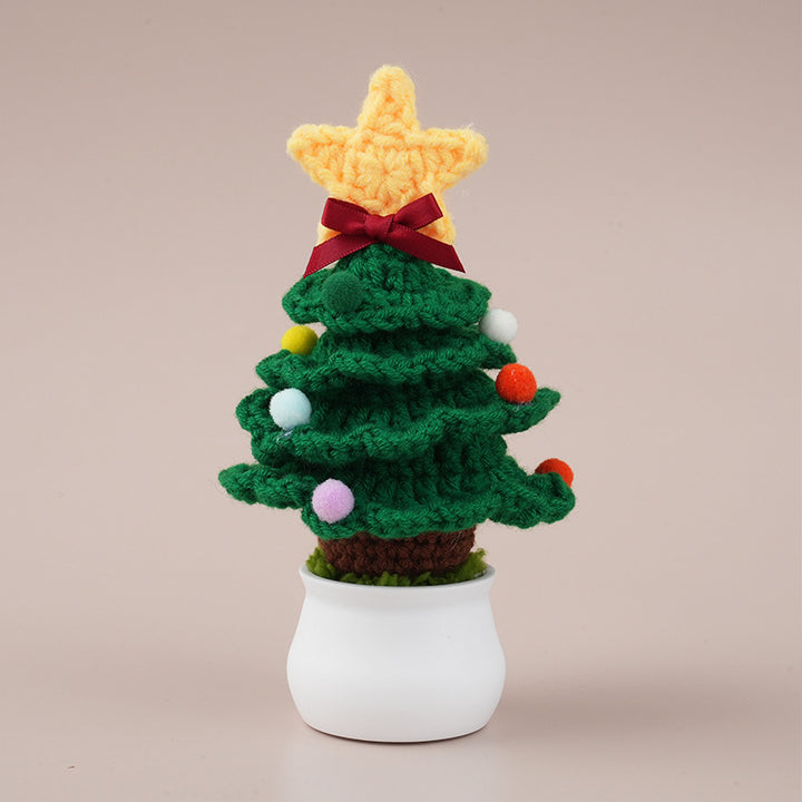 Handcrafted crocheted Christmas tree potted plant