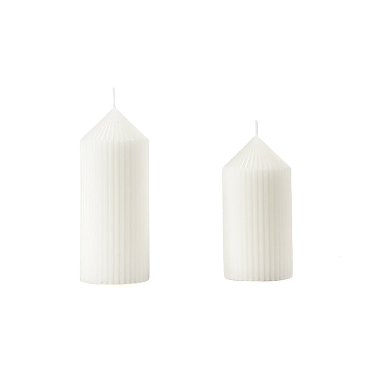 White tapered candle with striped pattern, Nordic