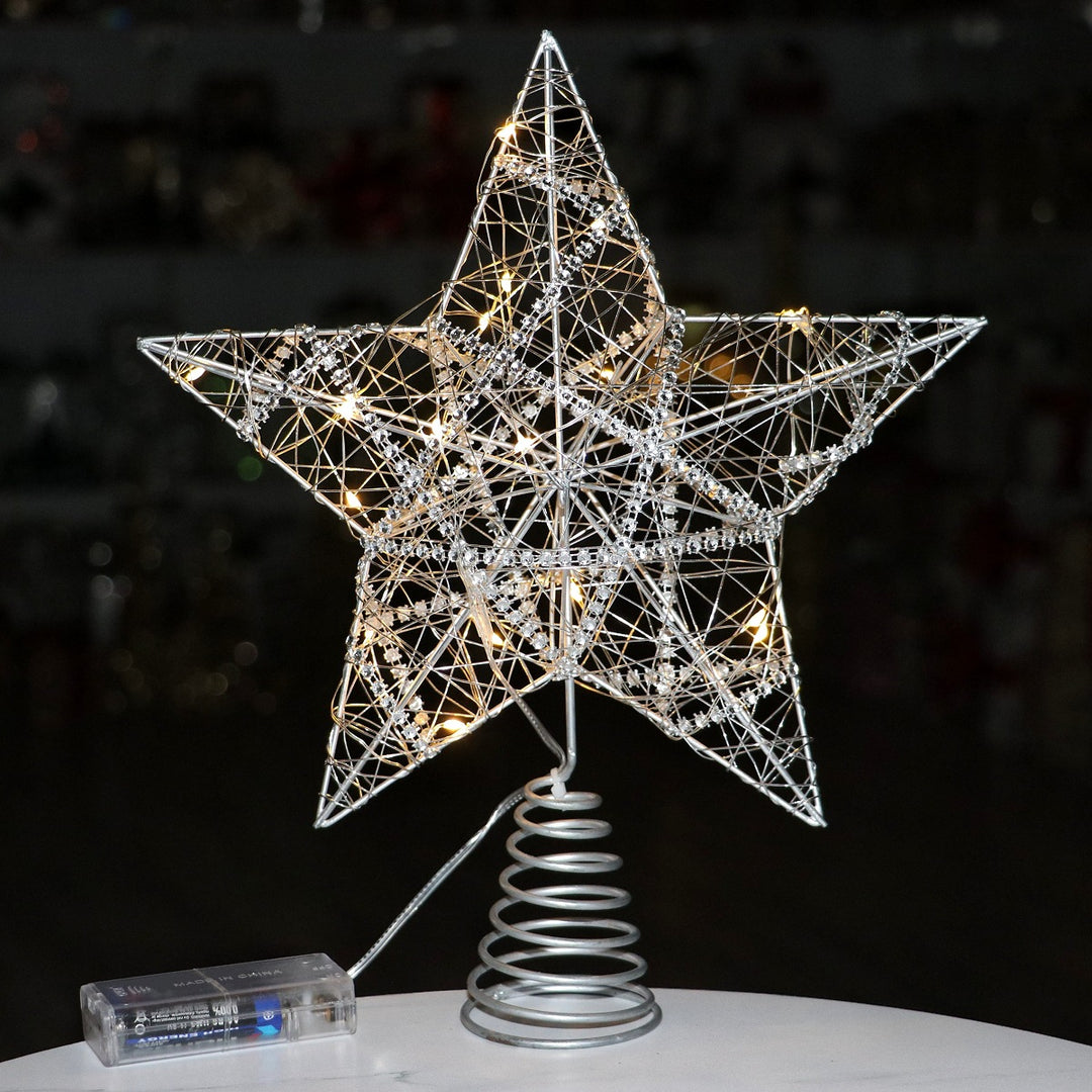 Christmas tree top star made of iron, illuminated