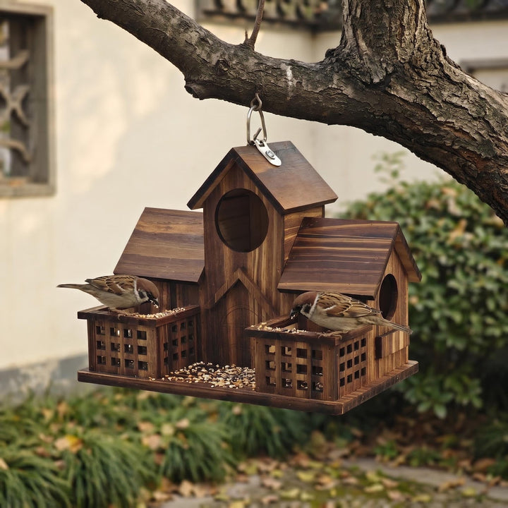 Birdhouse made of pine wood with feeding station
